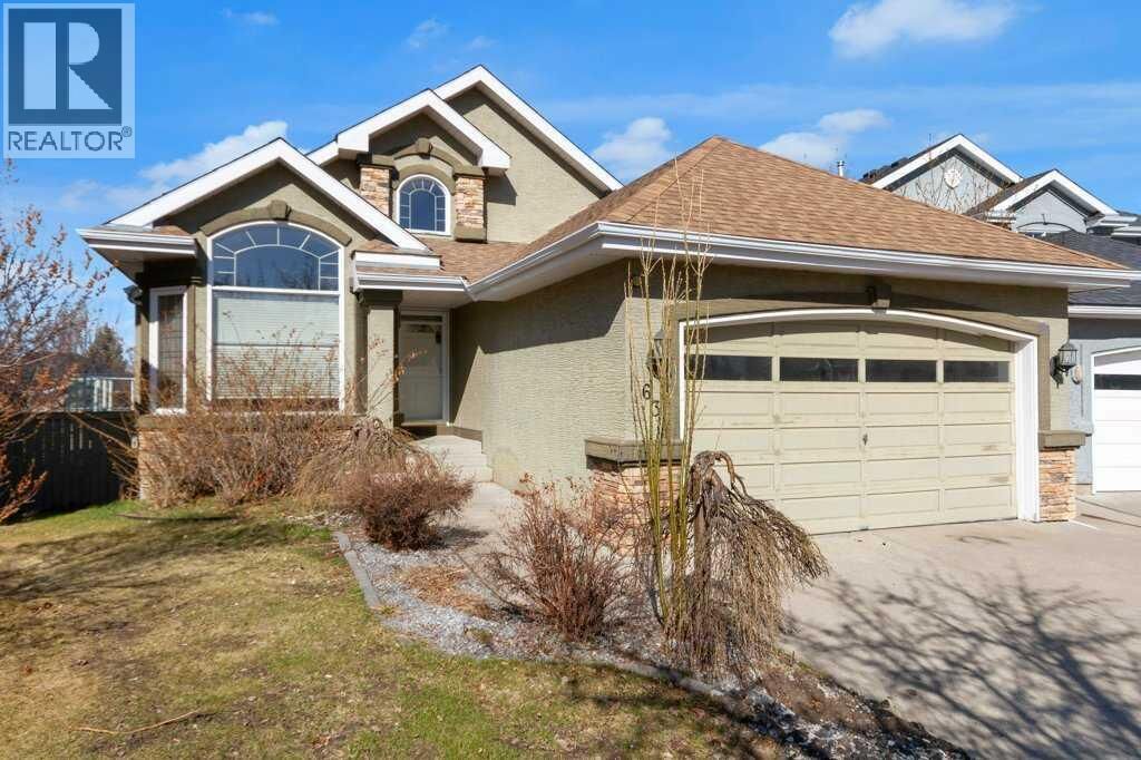 Property Photo:  63 Mt Assiniboine Circle Southeast  AB T2Z 2N6 