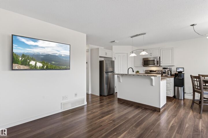 Property Photo:  702C Rocky Way  AB T9M 0H3 