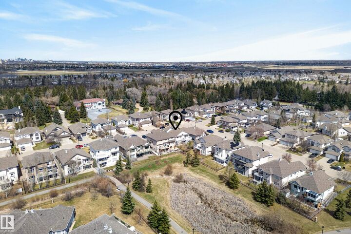 Property Photo:  10807 6 Avenue SW  AB T6W 1G3 