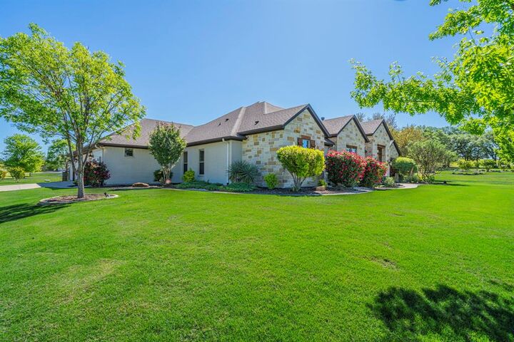 Property Photo:  100 Helton Drive  TX 76049 