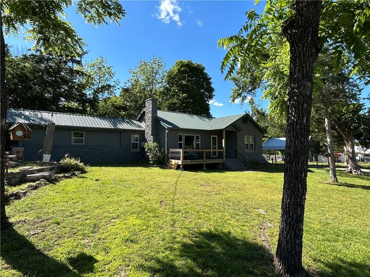 Property Photo:  1206 N Diamond Boulevard  AR 72644 