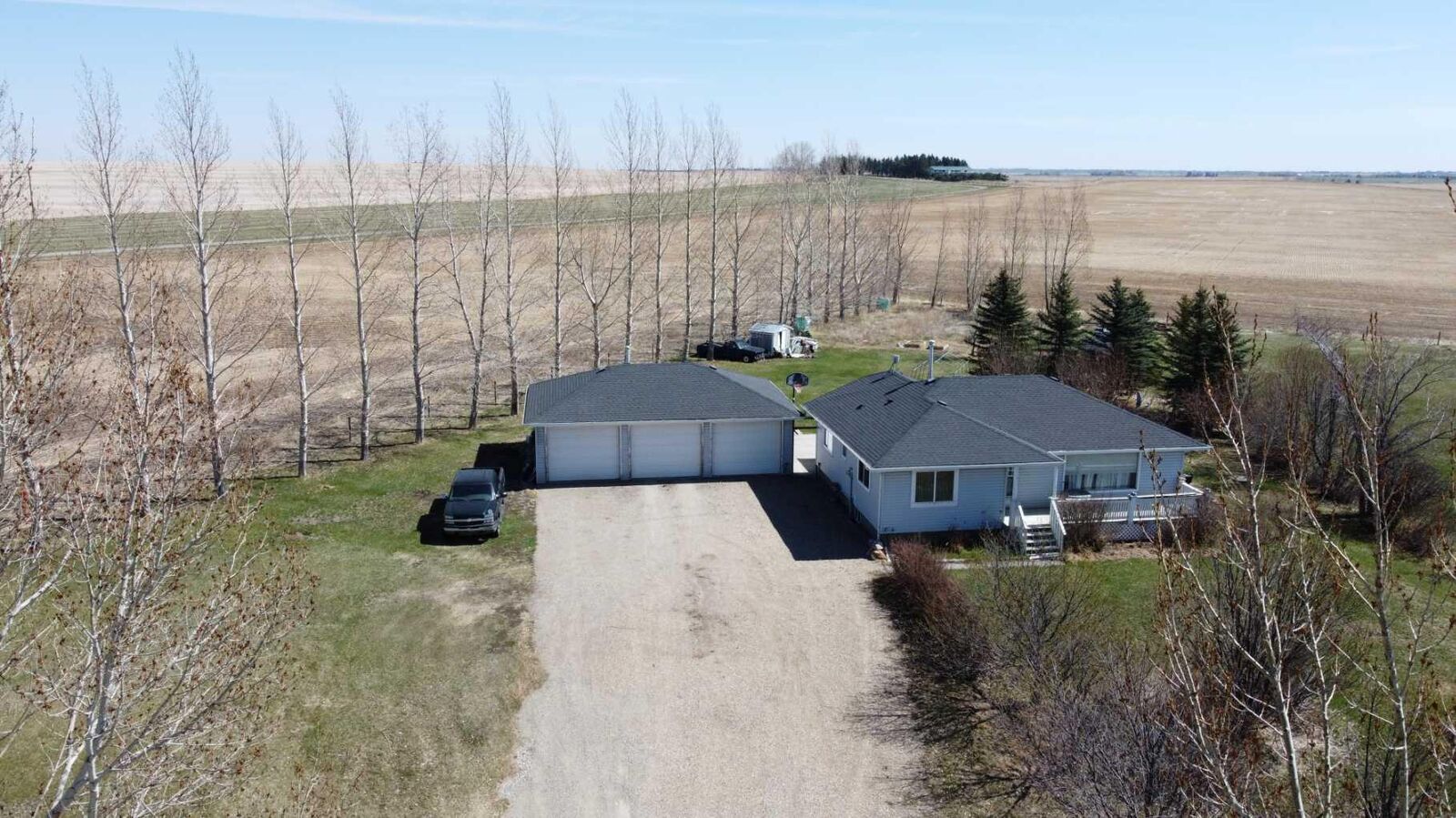 Property Photo:  242039 Range Road 261  AB T1P 0X1 