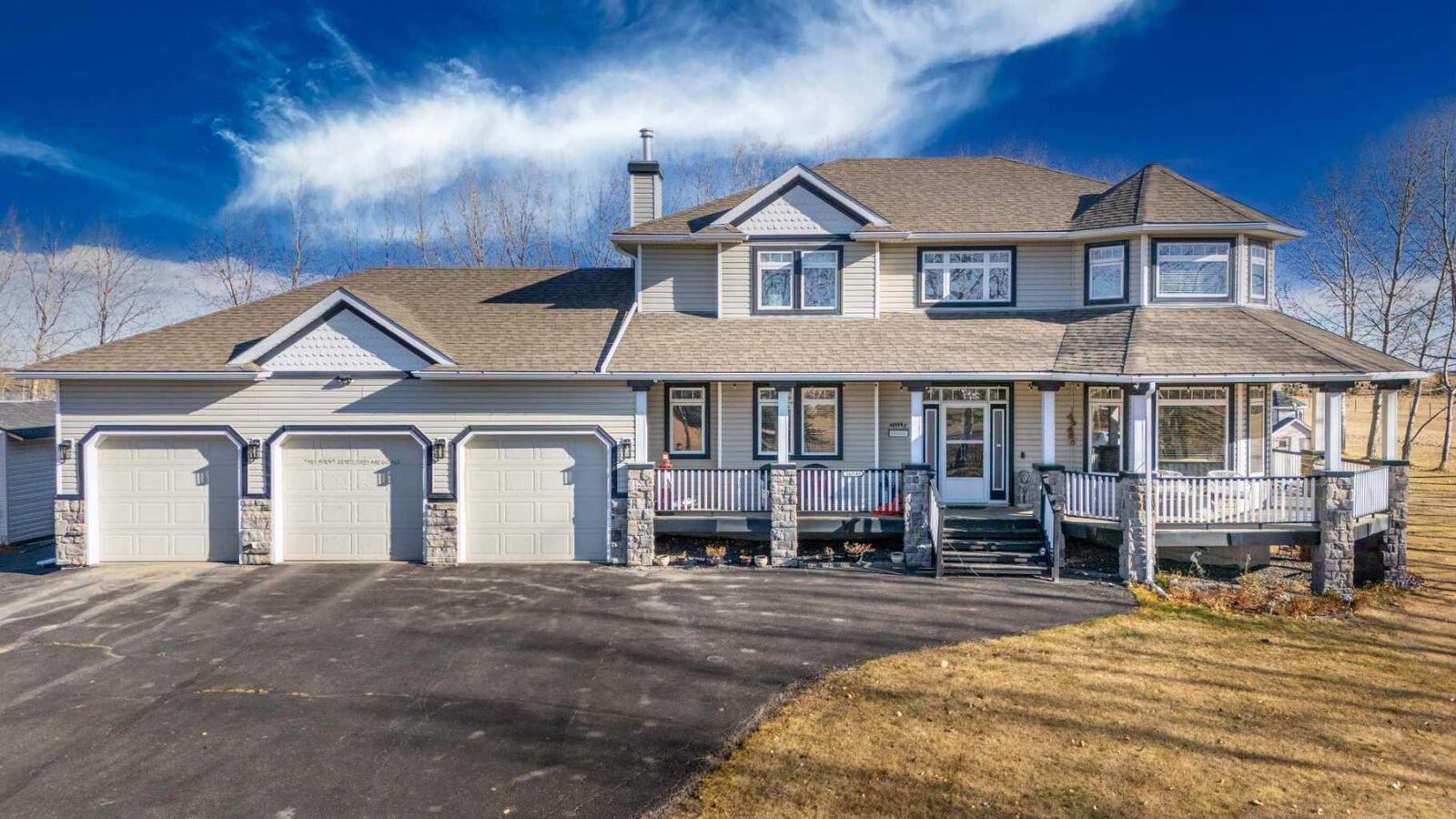 Property Photo:  263140 Butte Hills Way  AB T4A 0P6 