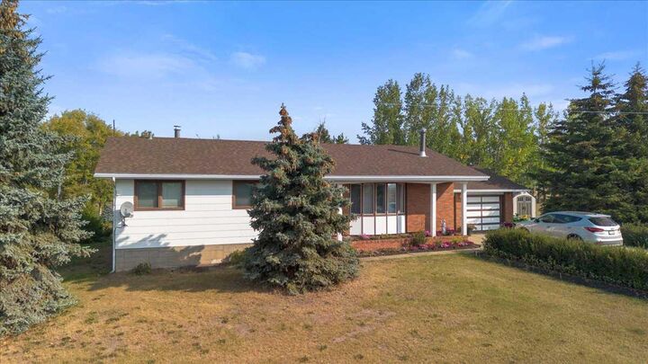 Property Photo: 742077 Range Road 64 AB T0H 3C0