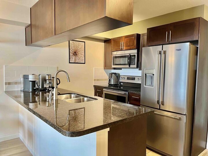 Property Photo:  5660 201A Street 348  BC V3A 0B4 