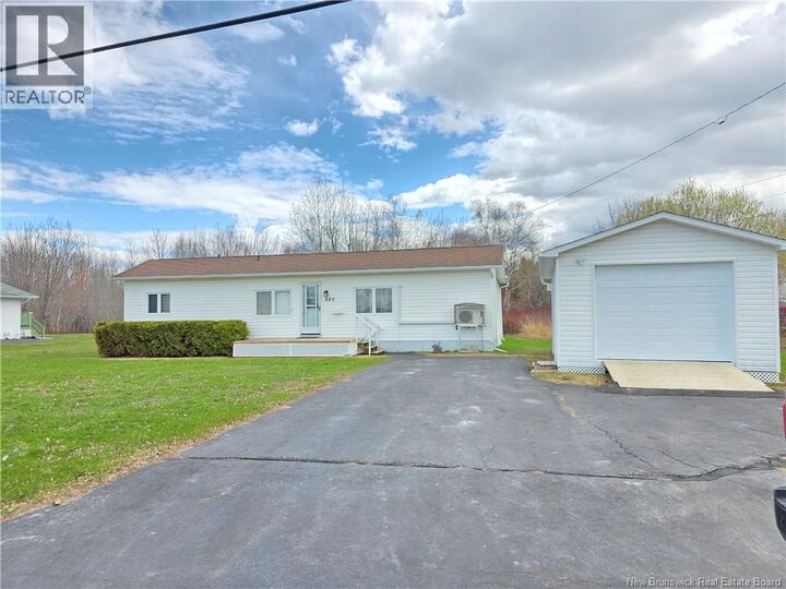Property Photo:  225 Parc  NB E8K 1V9 