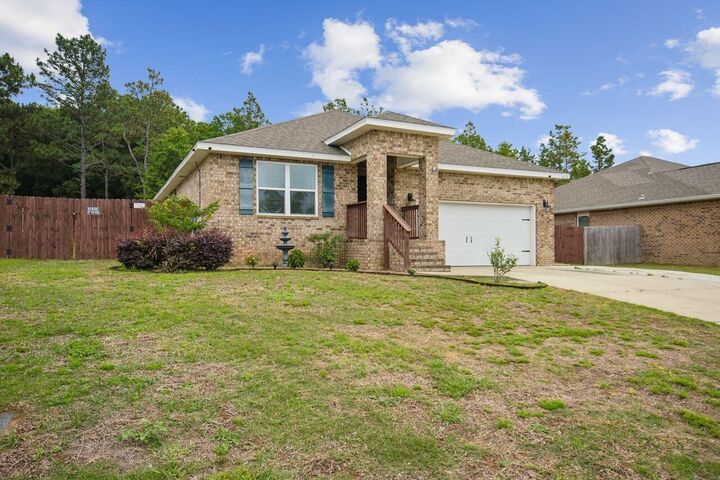 Property Photo:  4656 Red Oak Drive  FL 32583 