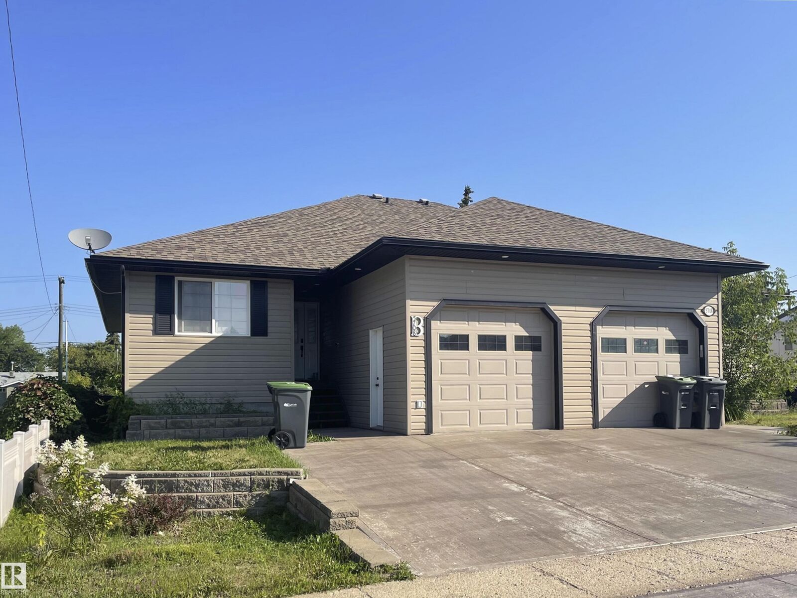 Property Photo:  5708B 51 Avenue  AB T9M 1S4 