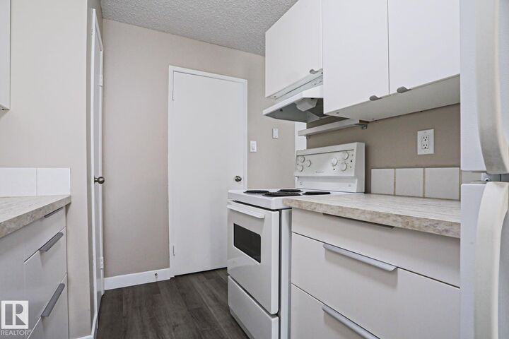 Property Photo:  7220 144 Avenue NW 118  AB T5C 3E4 
