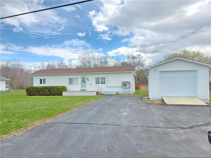 Property Photo:  225 Parc  NB E8K 1V9 