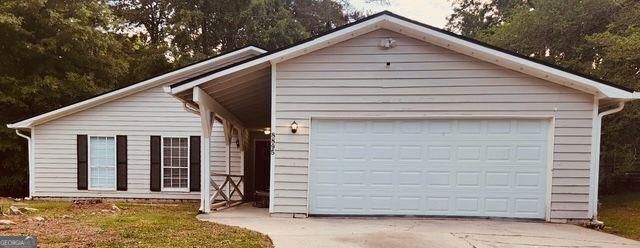 Property Photo:  8895 Wesley Place  GA 30238 