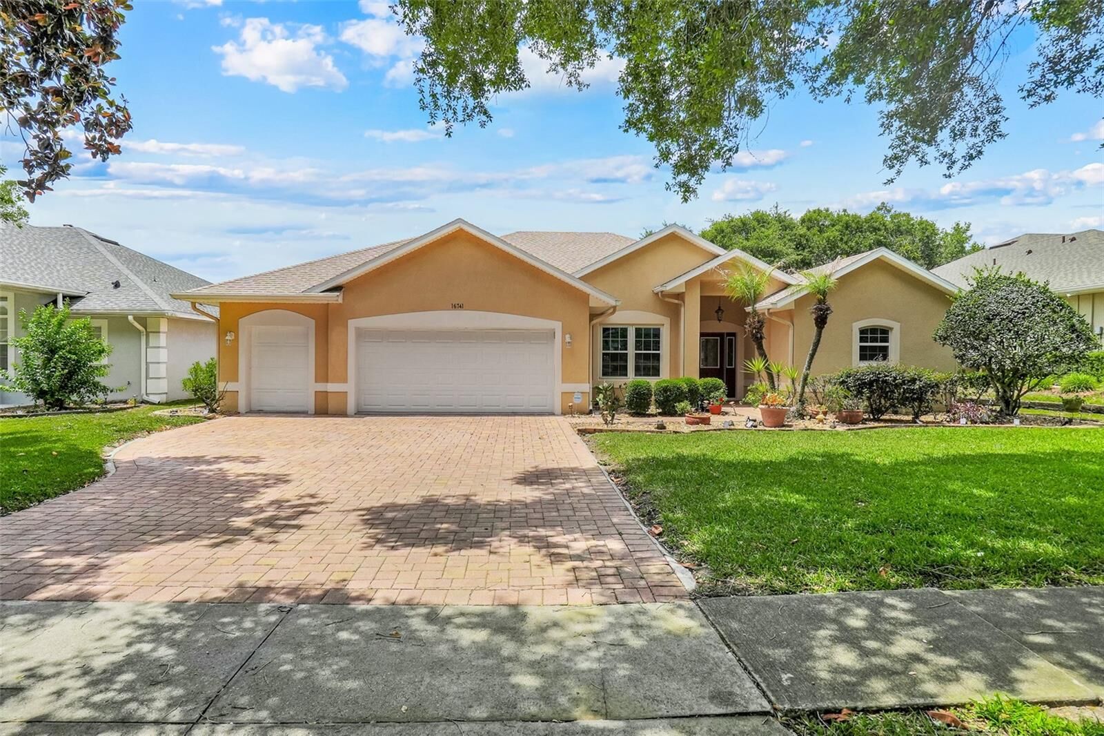 Property Photo:  16741 Tall Grass Lane  FL 34711 