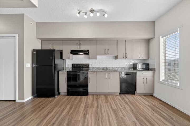 Property Photo:  4641 128 Avenue NE 1611  AB T3N 1T4 