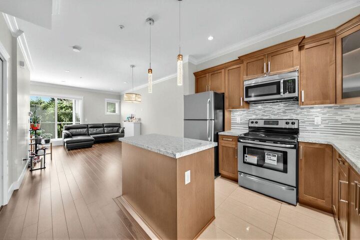 Property Photo:  7159 Stride Avenue 203A  BC V3N 1T8 