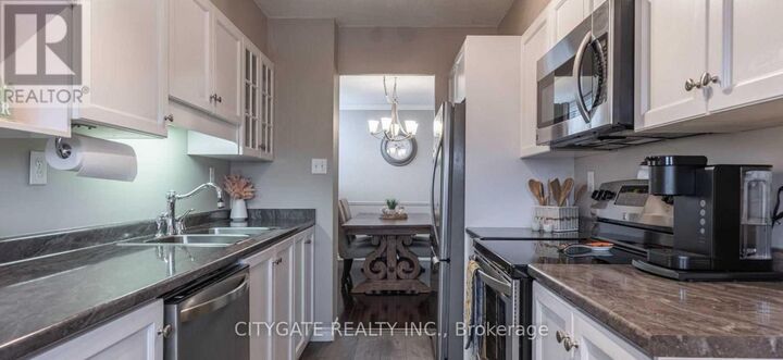 Property Photo:  1425 Ghent Avenue 202  ON L7S 1X5 
