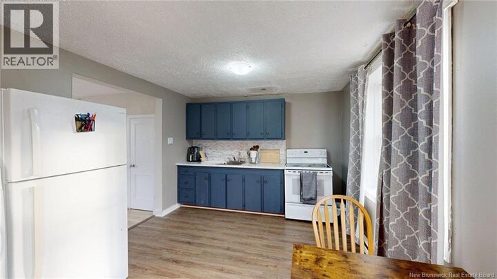 Property Photo:  235 Gilbert Street  NB E2K 4E4 
