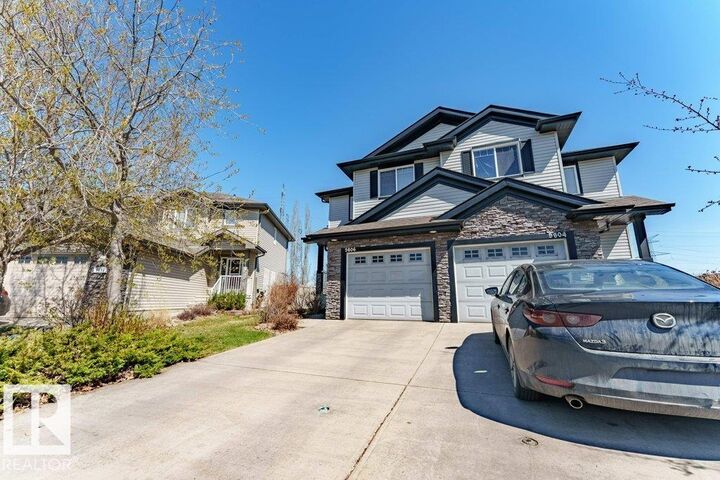 Property Photo:  5806 1A Avenue SW  AB T6K 0K8 