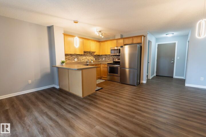 Property Photo: 4407 23 Street NW 404 AB T6T 0B6