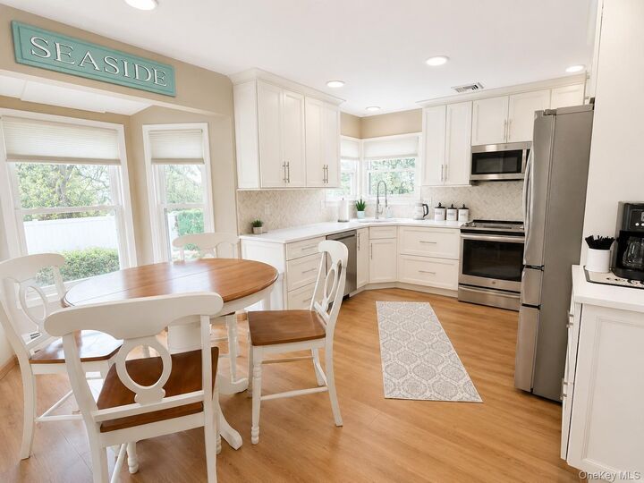 Property Photo:  11 Hollow Oak Drive  NY 11772 