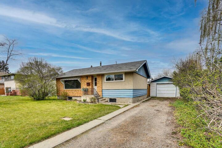Property Photo:  8316 43 Avenue NW  AB T3B 1X9 