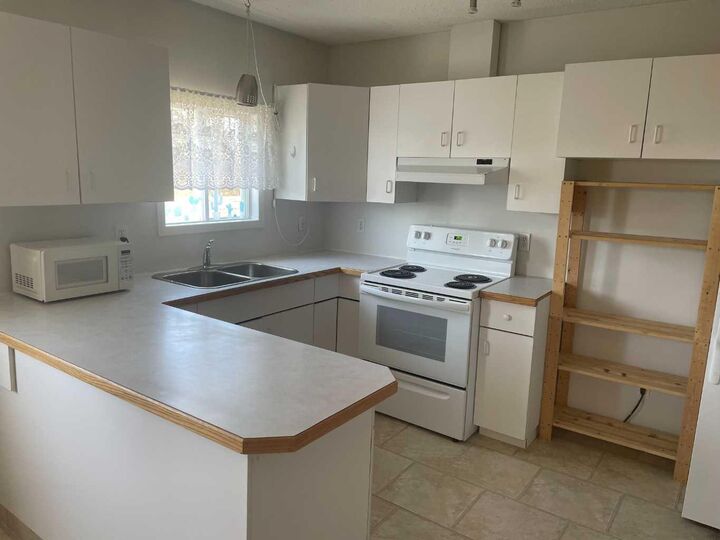 Property Photo:  11232 105 Avenue  AB T0H 1L0 