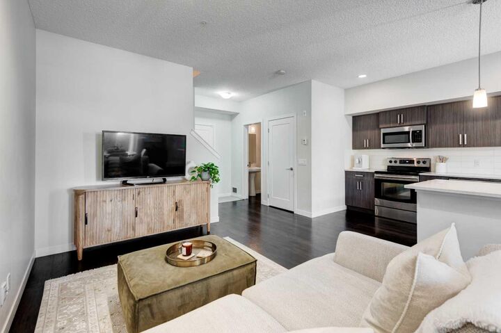 Property Photo:  7 Westpark Common SW 214  AB T3H 0Y4 