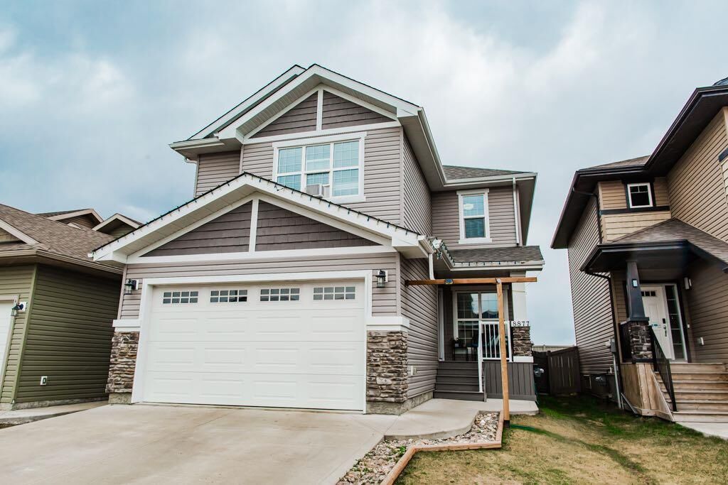 Property Photo:  8877 85A Avenue  AB T8X 0R5 