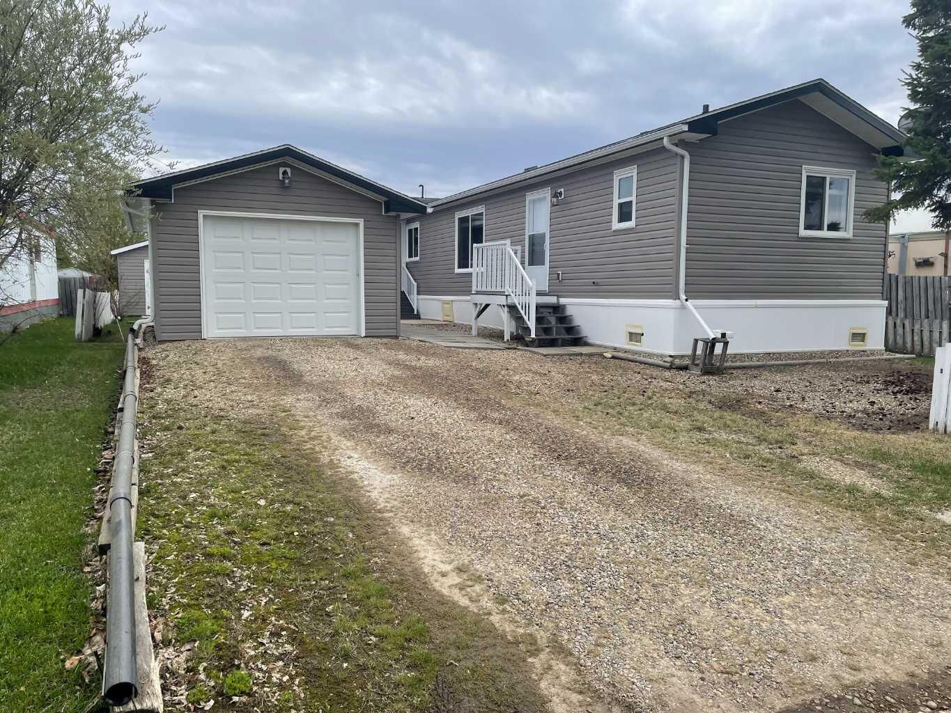 Property Photo:  10305 101 Street  AB T0H 1L0 