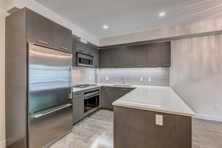 Property Photo:  323 20 Avenue SW 102  AB T2S 2G5 