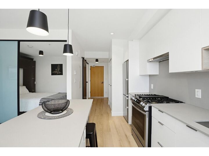 Property Photo:  2493 Montrose Avenue 407  BC V2S 3T2 