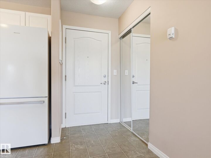 Property Photo:  12550 140 Avenue NW 217  AB T5X 6J4 
