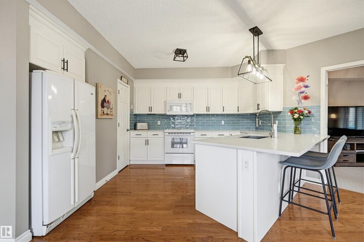 Property Photo:  9811 96A Street NW 201  AB T6A 4A4 