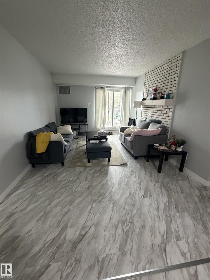 Property Photo:  10136 160 Street NW 205  AB T5P 3E7 