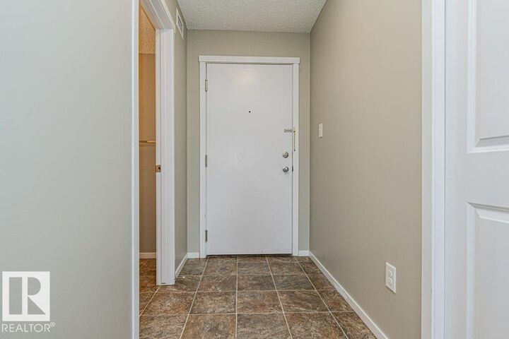 Property Photo:  18126 77 Street NW 305  AB T5Z 0N7 