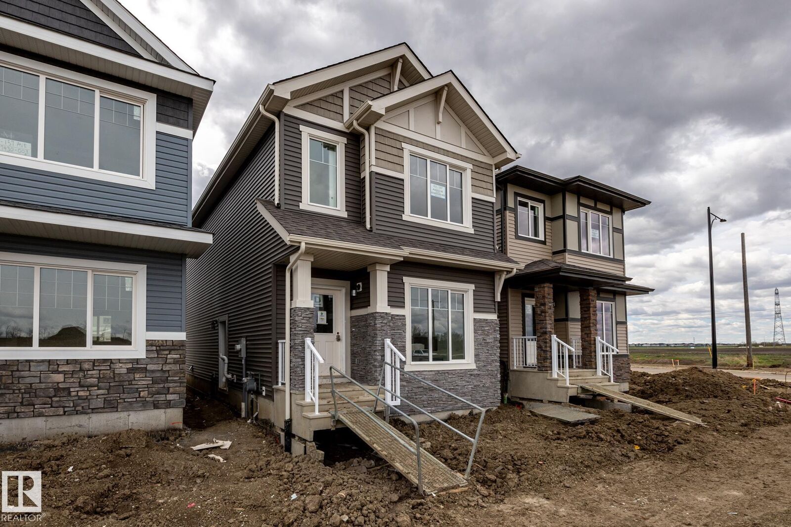 Property Photo:  211 157 Avenue NE  AB T5Y 6K8 