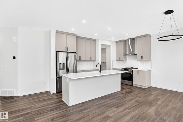 Property Photo: 1508 205 Street NW AB T6M 3E7