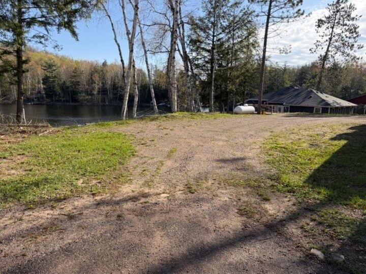 Property Photo:  N8483 Lower Long Lake Dr  WI 54435 