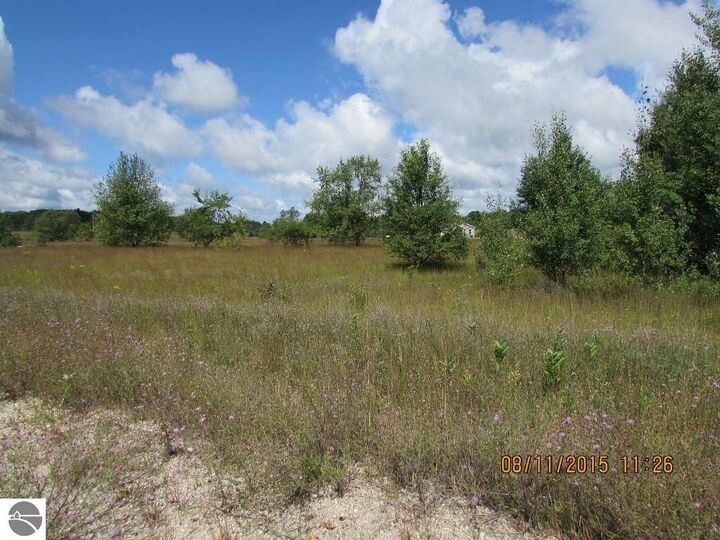 Property Photo:  852 Grouse Drive  MI 49646 