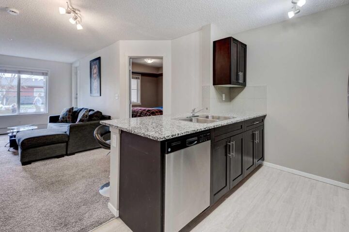 Property Photo:  81 Legacy Boulevard SE 2125  AB T2X 2B9 
