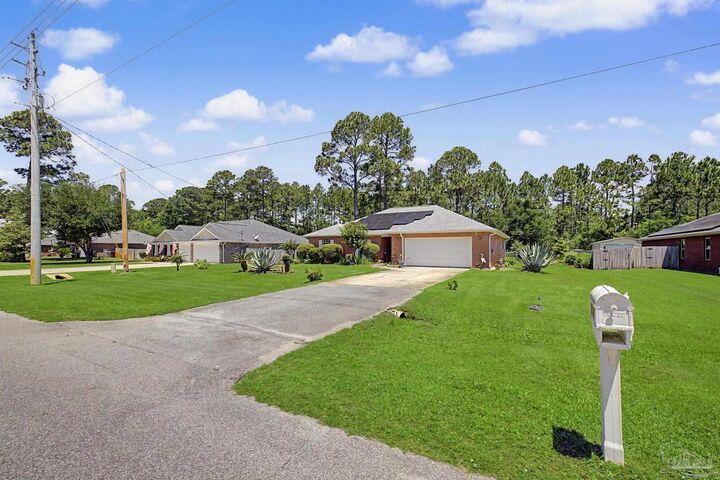 Property Photo: 7654 Manatee St FL 32566