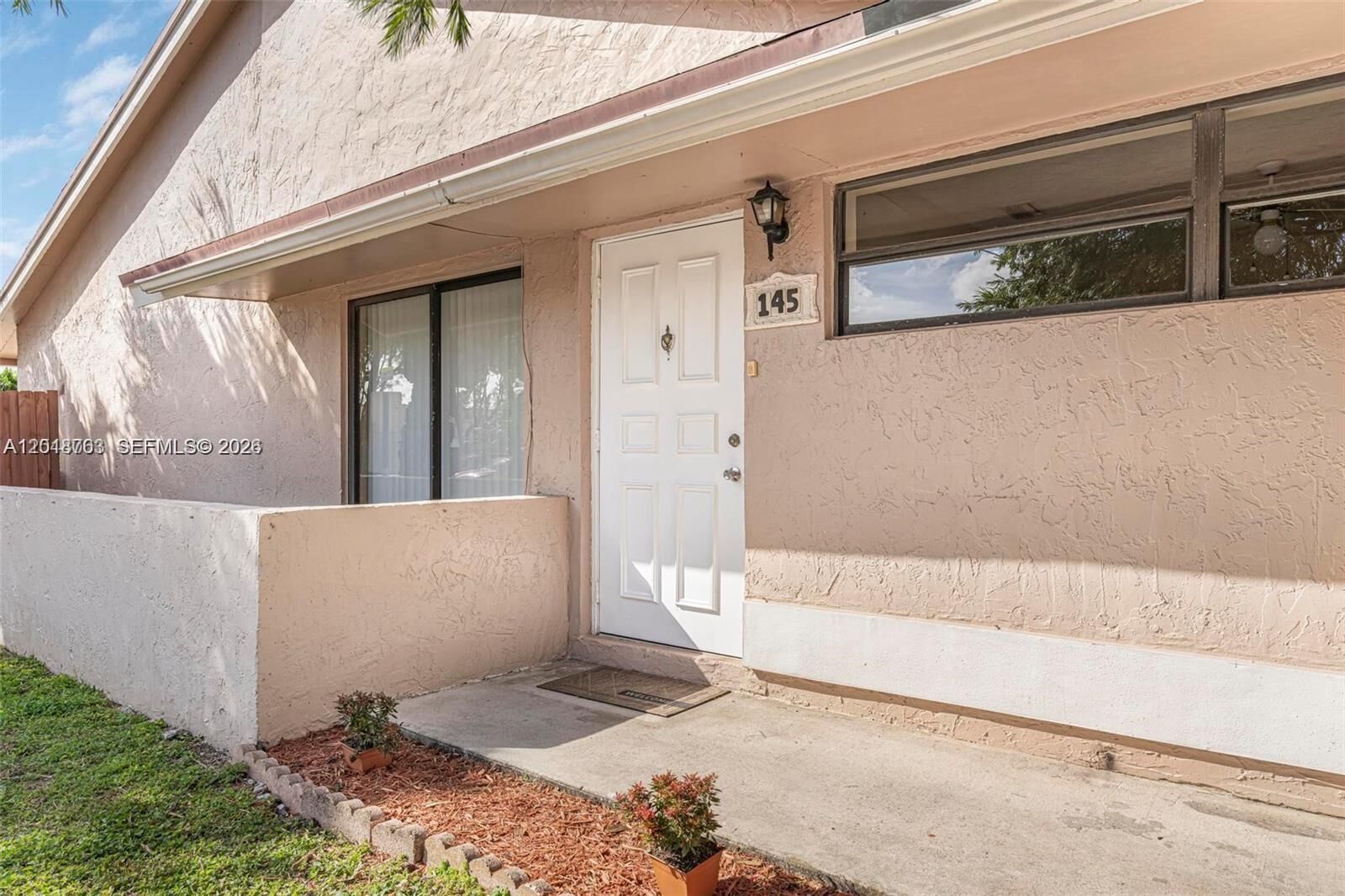 Property Photo:  7730 SW 156th Ct A145  FL 33193 