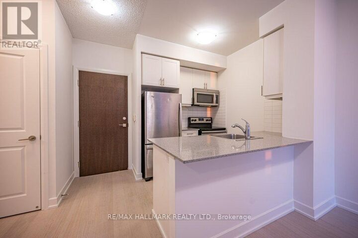 Property Photo:  6 Eva Road 212  ON M9C 0B1 