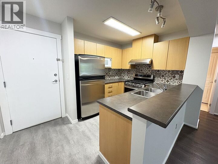 Property Photo: 9339 University Crescent 316 BC V5Y 4Y1