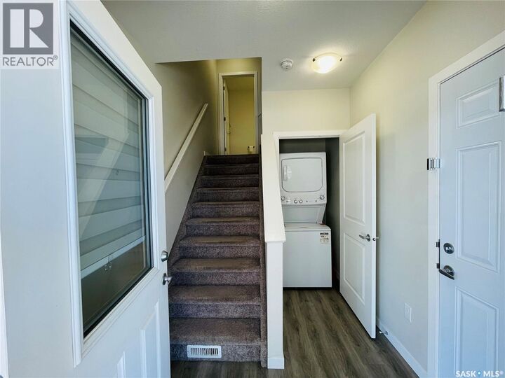 Property Photo: 104 3367 Green Poppy Street SK S4V 3P6