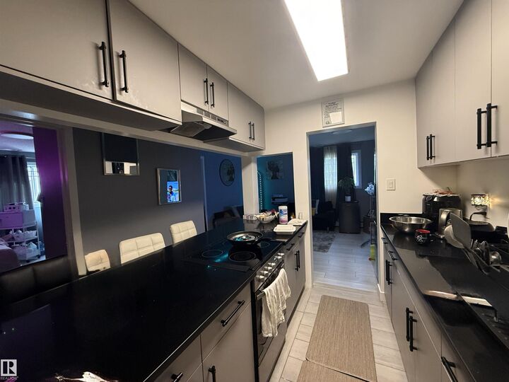 Property Photo:  12409 82 Street NW 102  AB T5B 2X5 