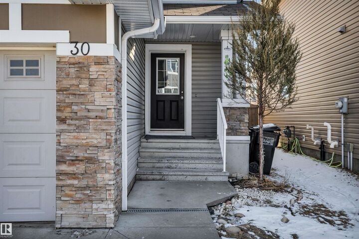 Property Photo: 655 Tamarack Road NW 30 AB T6T 0N4