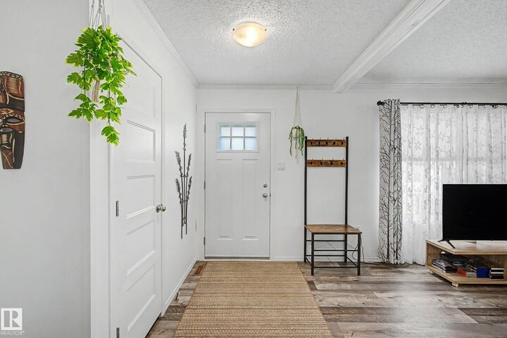 Property Photo:  12604 153 Avenue NW 15  AB T5X 4M7 