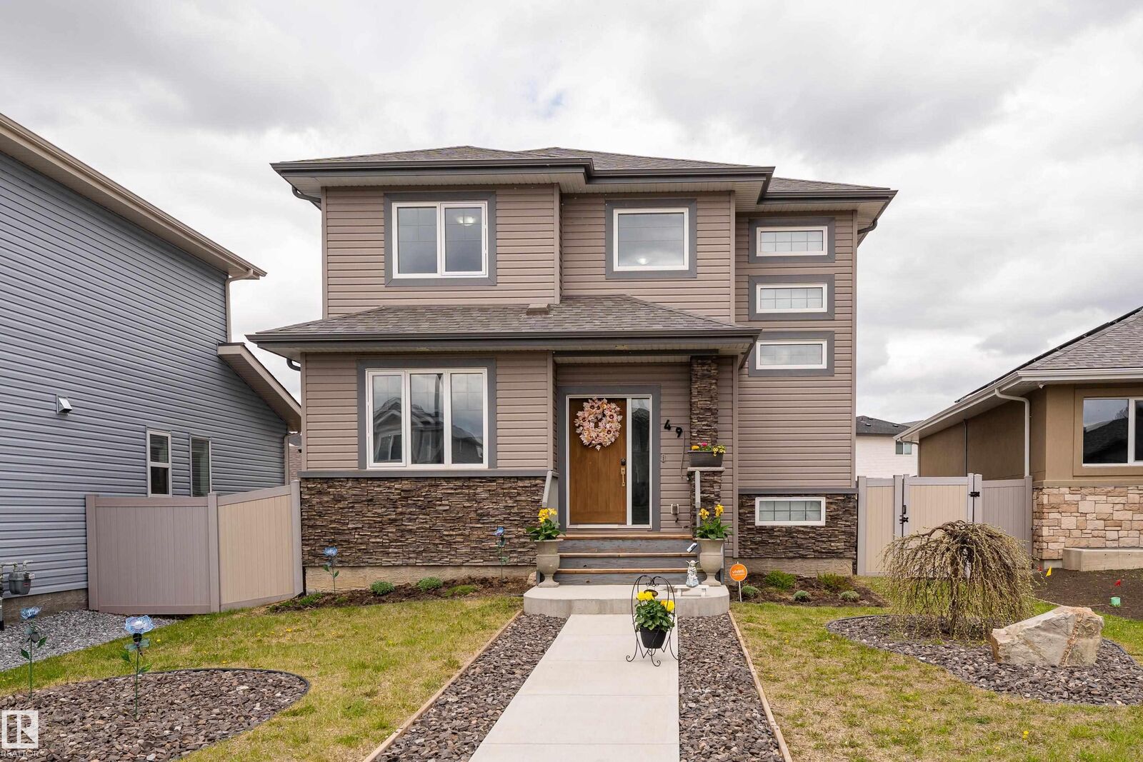 Property Photo: 49 Wilson Close AB T8L 0W7