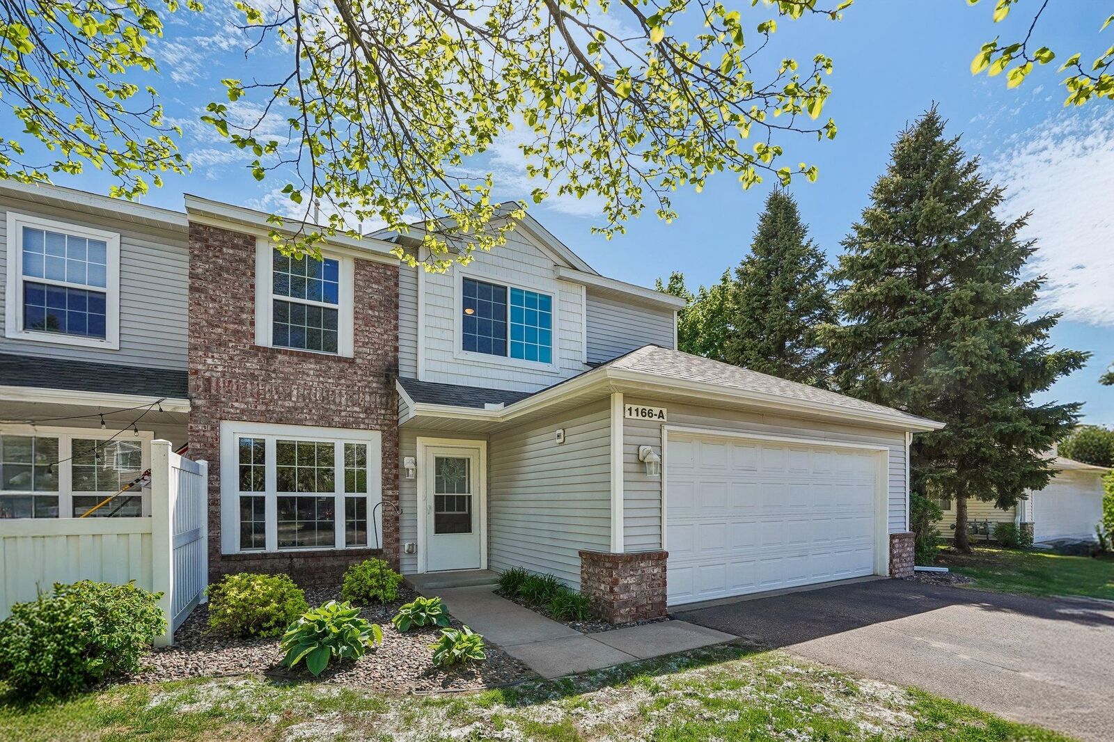 Property Photo:  1166 100th Drive NE A  MN 55434 