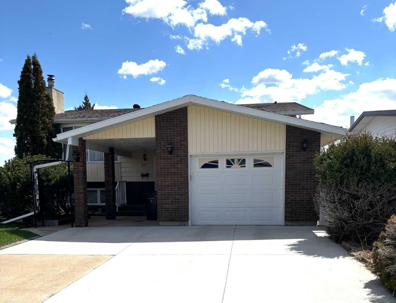 Property Photo:  47 Ryerson Road W  AB T1K 4N7 